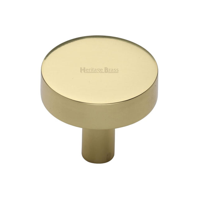 This is an image of a Heritage Brass - Cabinet Knob Disc Design 32mm Polished Brass Finish, c3880-32-pb that is available to order from T.H Wiggans Ironmongery in Kendal.