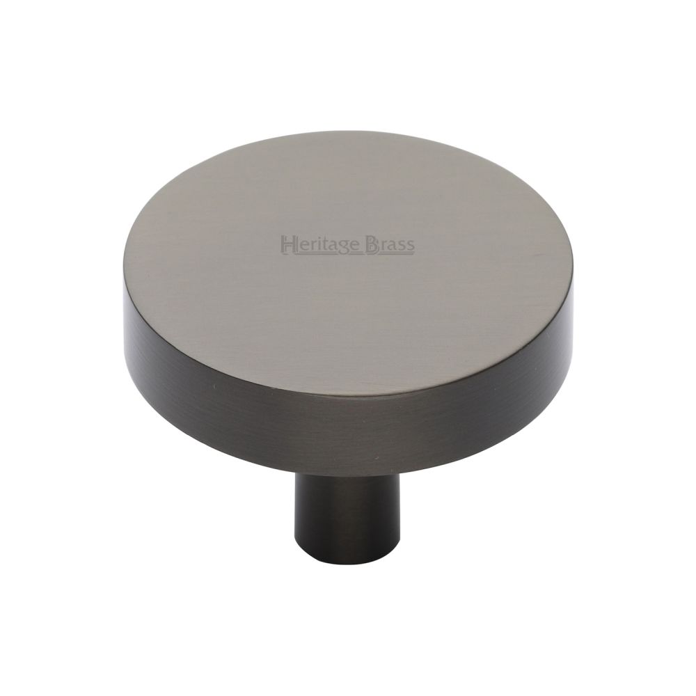 This is an image of a Heritage Brass - Cabinet Knob Disc Design 38mm Matt Bronze Finish, c3880-38-mb that is available to order from T.H Wiggans Ironmongery in Kendal.