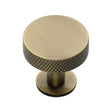 This is an image of a Heritage Brass - Cabinet Knob Disc Knurled Design with Rose 32mm Antique Brass Fini, c3882-32-at that is available to order from T.H Wiggans Ironmongery in Kendal.