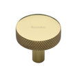 This is an image of a Heritage Brass - Cabinet Knob Knurled Disc Design 32mm Polished Brass Finish, c3884-32-pb that is available to order from T.H Wiggans Ironmongery in Kendal.