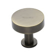 This is an image of a Heritage Brass - Cabinet Knob Disc Design with Rose 38mm Antique Brass Finish, c3885-38-at that is available to order from T.H Wiggans Ironmongery in Kendal.