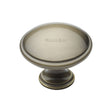 This is an image of a Heritage Brass - Cabinet Knob Domed Design 38mm Antique Brass Finish, c3950-38-at that is available to order from T.H Wiggans Ironmongery in Kendal.
