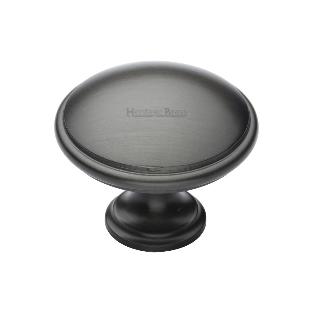This is an image of a Heritage Brass - Cabinet Knob Domed Design 38mm Matt Bronze Finish, c3950-38-mb that is available to order from T.H Wiggans Ironmongery in Kendal.