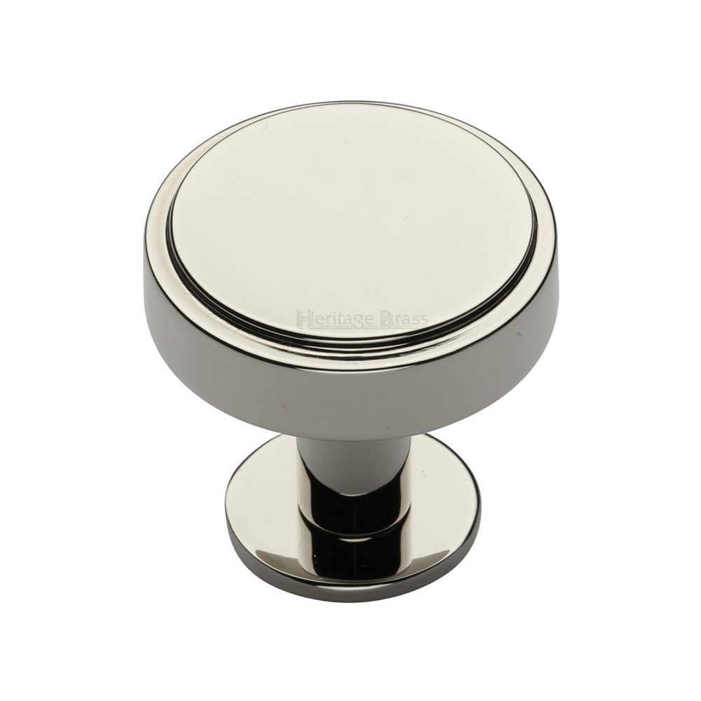 This is an image of a Heritage Brass - Cabinet Knob Stepped Disc Design with Rose 32mm Polished Nickel Fin, c3954-32-pnf that is available to order from T.H Wiggans Ironmongery in Kendal.