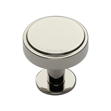This is an image of a Heritage Brass - Cabinet Knob Stepped Disc Design with Rose 32mm Polished Nickel Fin, c3954-32-pnf that is available to order from T.H Wiggans Ironmongery in Kendal.