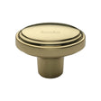 This is an image of a Heritage Brass - Cabinet Knob Stepped Oval Design 41mm Polished Brass Finish, c3975-pb that is available to order from T.H Wiggans Ironmongery in Kendal.