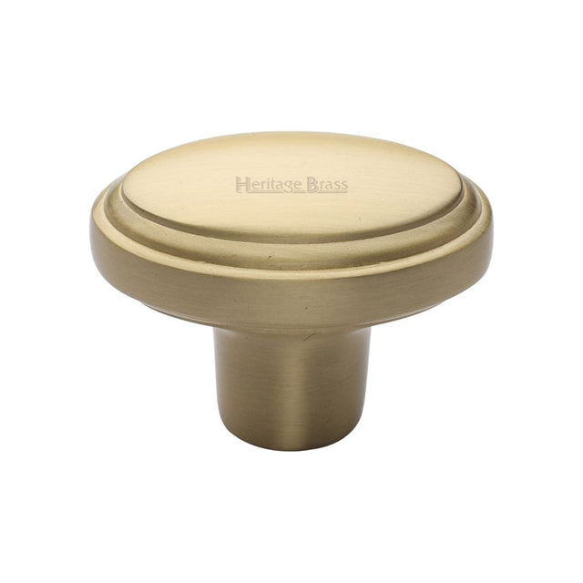 This is an image of a Heritage Brass - Cabinet Knob Stepped Oval Design 41mm Satin Brass Finish, c3975-sb that is available to order from T.H Wiggans Ironmongery in Kendal.