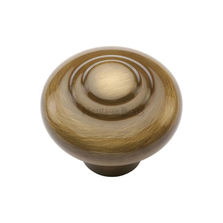 This is an image of a Heritage Brass - Cabinet Knob Round Bead Design 32mm Antique Brass Finish, c3985-32-at that is available to order from T.H Wiggans Ironmongery in Kendal.