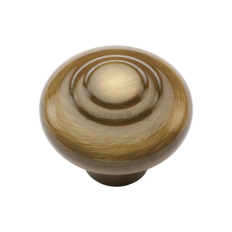 This is an image of a Heritage Brass - Cabinet Knob Round Bead Design 38mm Antique Brass Finish, c3985-38-at that is available to order from T.H Wiggans Ironmongery in Kendal.