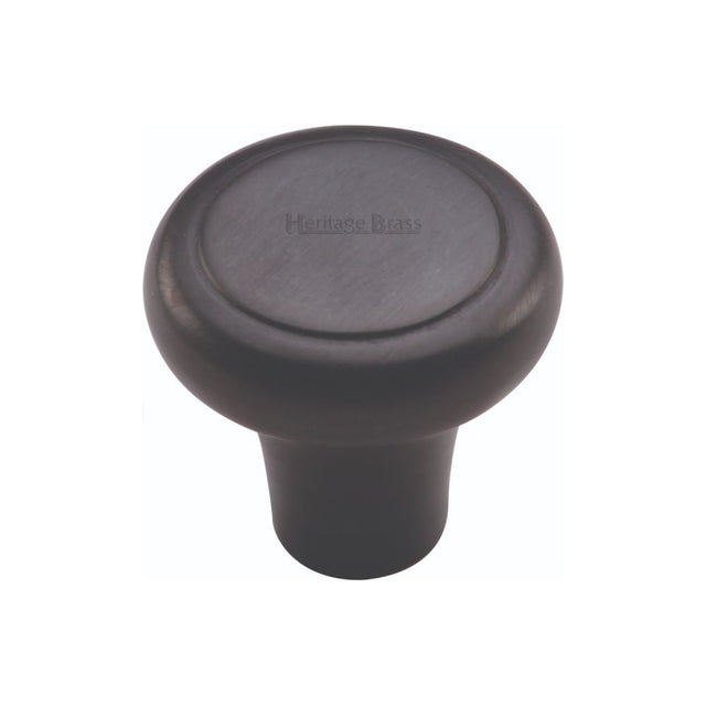 This is an image of a Heritage Brass - Cabinet Knob Round Edge Design 32mm Matt Black Finish, c3990-32-bkmt that is available to order from T.H Wiggans Ironmongery in Kendal.