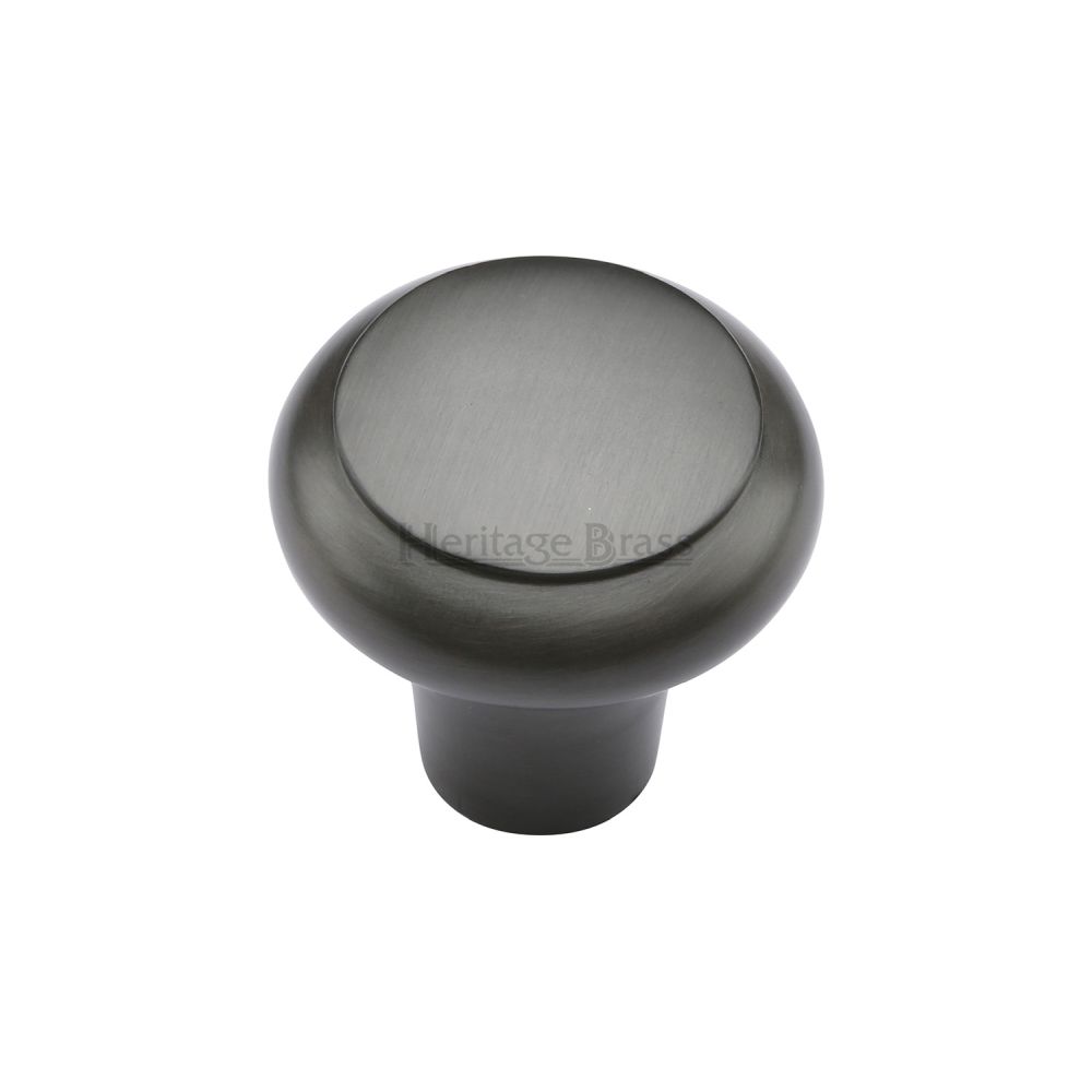 This is an image of a Heritage Brass - Cabinet Knob Round Edge Design 38mm Matt Bronze Finish, c3990-38-mb that is available to order from T.H Wiggans Ironmongery in Kendal.