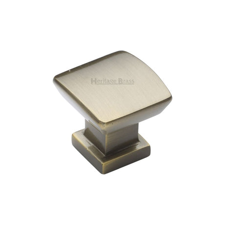 This is an image of a Heritage Brass - Cabinet Knob Plinth Square Design with base 25mm Antique Brass Fin, c4382-25-at that is available to order from T.H Wiggans Ironmongery in Kendal.