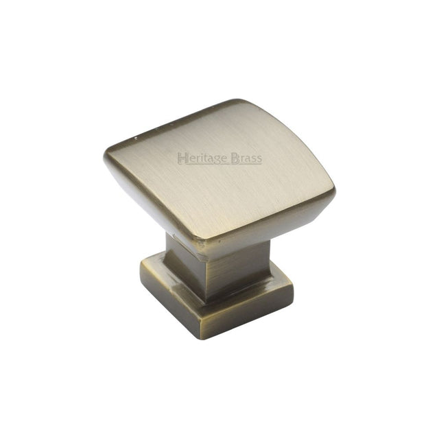 This is an image of a Heritage Brass - Cabinet Knob Plinth Square Design with base 25mm Antique Brass Fin, c4382-25-at that is available to order from T.H Wiggans Ironmongery in Kendal.