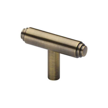 This is an image of a Heritage Brass - Cabinet Knob Stepped T-Bar Design 45mm Antique Brass Finish, c4445-at that is available to order from T.H Wiggans Ironmongery in Kendal.