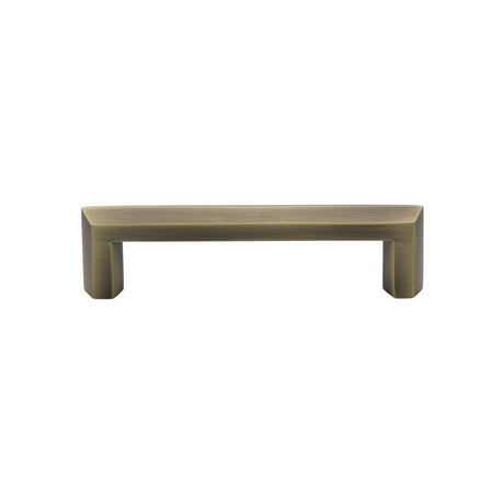 This is an image of a Heritage Brass - Cabinet Pull Hex Profile Design 102mm CTC Antique Brass Finish, c4473-102-at that is available to order from T.H Wiggans Ironmongery in Kendal.