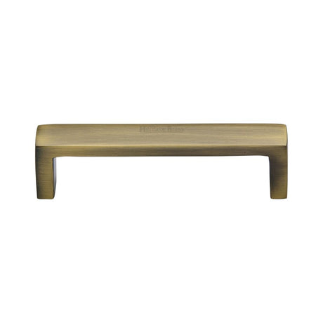 This is an image of a Heritage Brass - Cabinet Pull Wide Metro Design 101mm CTC Antique Brass Finish, c4520-101-at that is available to order from T.H Wiggans Ironmongery in Kendal.