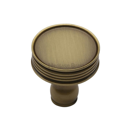 This is an image of a Heritage Brass - Cabinet Knob Venetian Design 32mm Antique Brass Finish, c4547-at that is available to order from T.H Wiggans Ironmongery in Kendal.