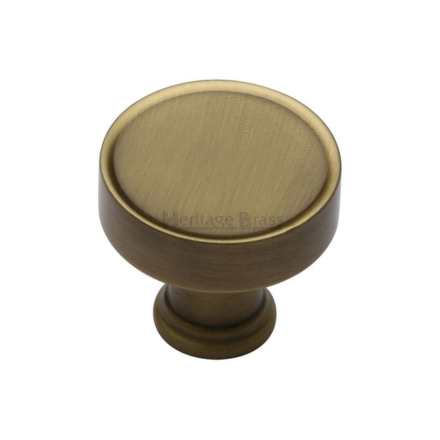This is an image of a Heritage Brass - Cabinet Knob Florence Design 32mm Antique Brass Finish, c4549-at that is available to order from T.H Wiggans Ironmongery in Kendal.