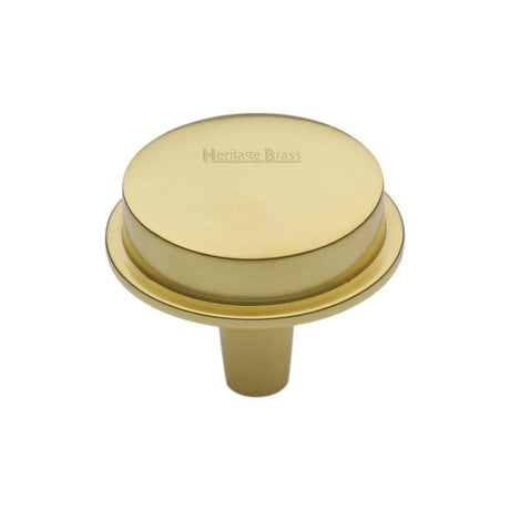 This is an image of a Heritage Brass - Flat Round Knob Design 32 mm Polished Brass finish, c4592-32-pb that is available to order from T.H Wiggans Ironmongery in Kendal.