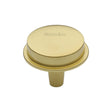 This is an image of a Heritage Brass - Flat Round Knob Design 32 mm Polished Brass finish, c4592-32-pb that is available to order from T.H Wiggans Ironmongery in Kendal.