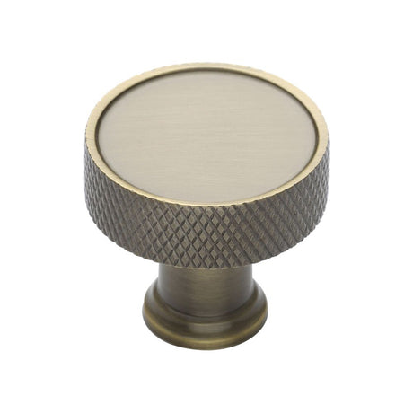 This is an image of a Heritage Brass - Cabinet Knob Florence Knurled Design 32mm Antique Brass Finish, c4648-32-at that is available to order from T.H Wiggans Ironmongery in Kendal.