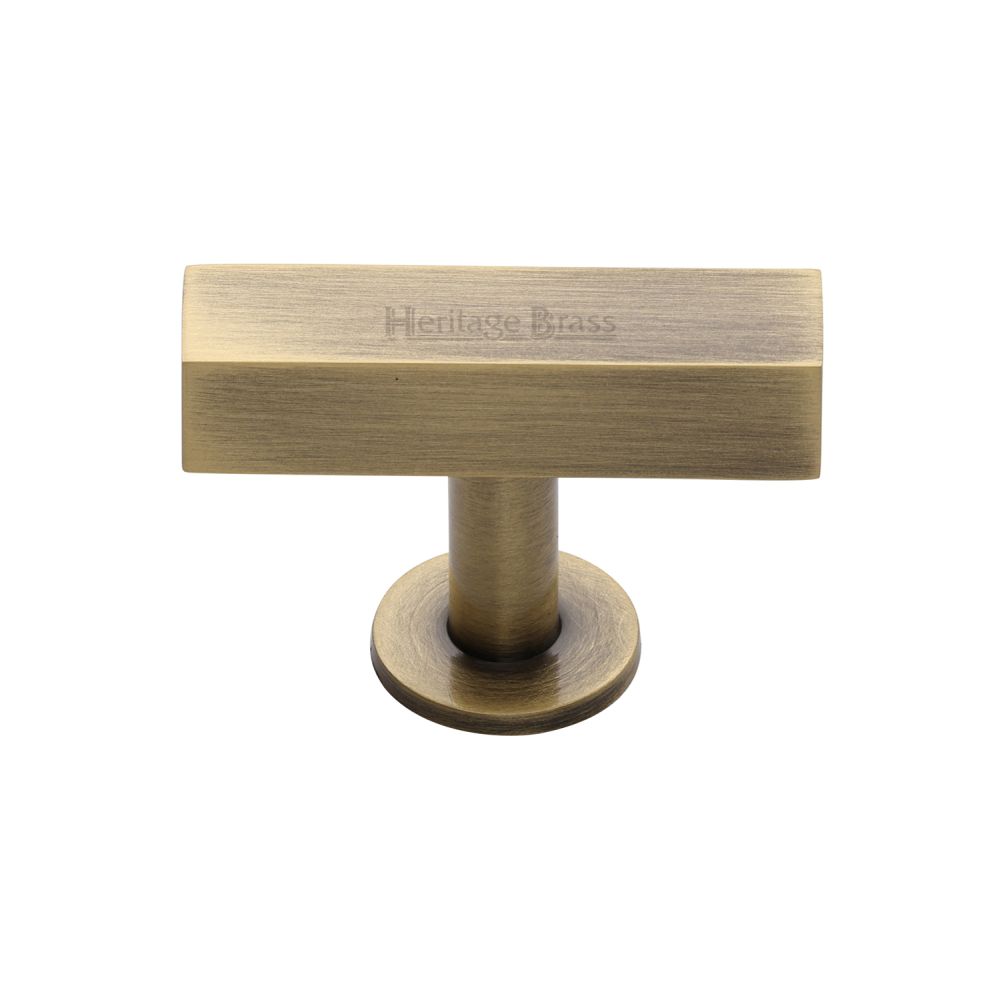 This is an image of a Heritage Brass - Cabinet Knob Symmetrical Square Design 44mm Antique Brass Finish, c4765-at that is available to order from T.H Wiggans Ironmongery in Kendal.