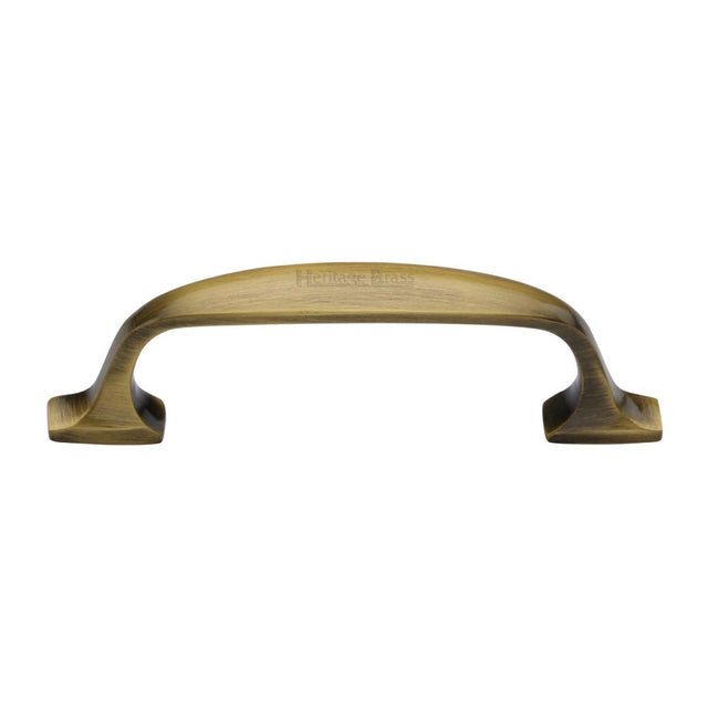 This is an image of a Heritage Brass - Cabinet Pull Durham Design 76mm CTC Antique Brass Finish, c7213-76-at that is available to order from T.H Wiggans Ironmongery in Kendal.