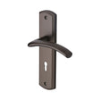 This is an image of a Heritage Brass - Door Handle Lever Lock Centaur Design Matt Bronze Finish, cen1000-mb that is available to order from T.H Wiggans Ironmongery in Kendal.