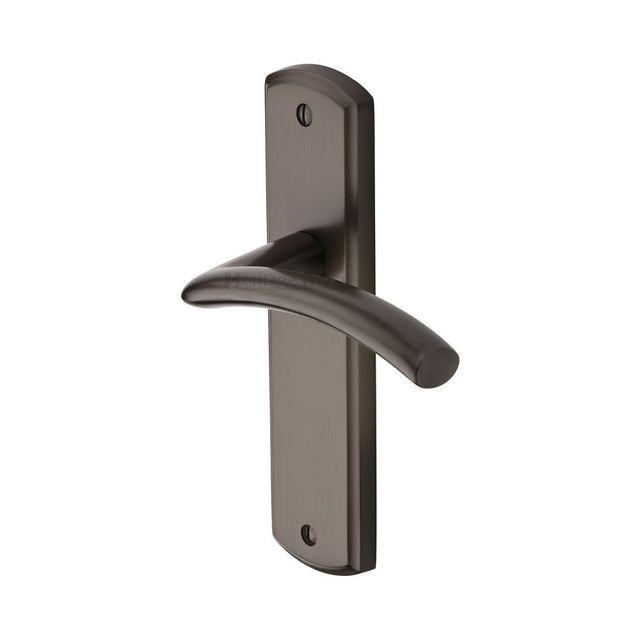 This is an image of a Heritage Brass - Door Handle Lever Latch Centaur Design Matt Bronze Finish, cen1010-mb that is available to order from T.H Wiggans Ironmongery in Kendal.