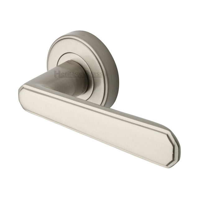 This is an image of a Heritage Brass - Door Handle Lever Latch on Round Rose Century Design Satin Nicke, cen1924-sn that is available to order from T.H Wiggans Ironmongery in Kendal.