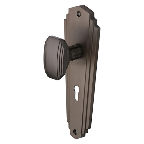 This is an image of a Heritage Brass - Mortice Knob on Lock Plate Charlston Design Matt Bronze Finish, cha1900-mb that is available to order from T.H Wiggans Ironmongery in Kendal.