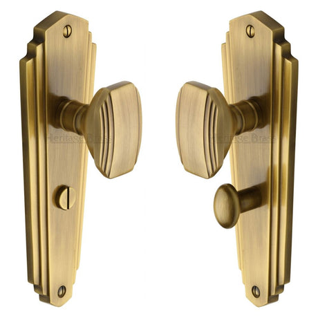 This is an image of a Heritage Brass - Mortice Knob on Bathroom Plate Charlston Design Antique Brass Fini, cha1930-at that is available to order from T.H Wiggans Ironmongery in Kendal.