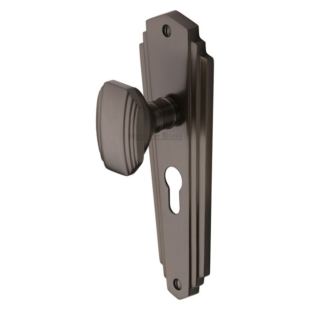 This is an image of a Heritage Brass - Mortice Knob on Euro Profile Plate Charlston Design Matt Bronze, cha1948-mb that is available to order from T.H Wiggans Ironmongery in Kendal.