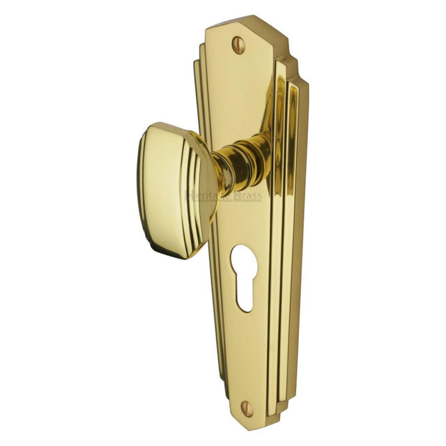 This is an image of a Heritage Brass - Mortice Knob on Euro Profile Plate Charlston Design Polished Brass, cha1948-pb that is available to order from T.H Wiggans Ironmongery in Kendal.