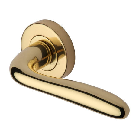 This is an image of a Heritage Brass - Door Handle Lever Latch on Round Rose Columbus Design Polished Bras, col1762-pb that is available to order from T.H Wiggans Ironmongery in Kendal.
