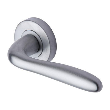 This is an image of a Heritage Brass - Door Handle Lever Latch on Round Rose Columbus Design Satin Chro, col1762-sc that is available to order from T.H Wiggans Ironmongery in Kendal.