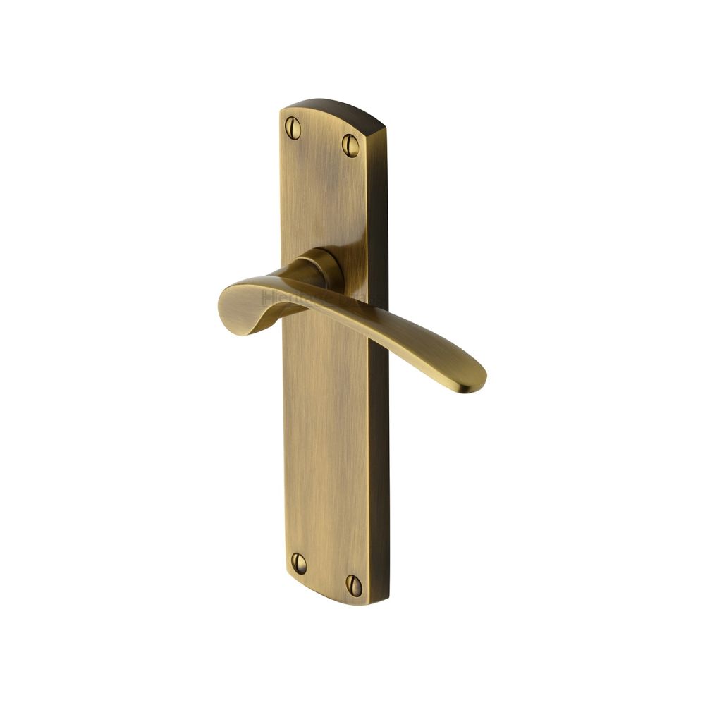 This is an image of a Heritage Brass - Door Handle Lever Latch Diplomat Design Antique Brass Finish, dip7810-at that is available to order from T.H Wiggans Ironmongery in Kendal.