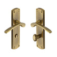 This is an image of a Heritage Brass - Door Handle for Bathroom Diplomat Design Antique Brass Finish, dip7830-at that is available to order from T.H Wiggans Ironmongery in Kendal.