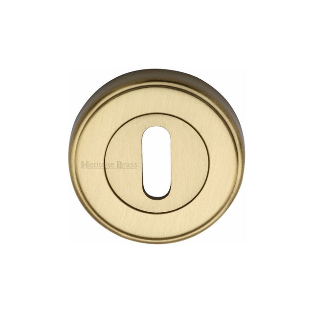 This is an image of a Heritage Brass - Key Escutcheon Satin Brass Finish, erd7000-sb that is available to order from T.H Wiggans Ironmongery in Kendal.