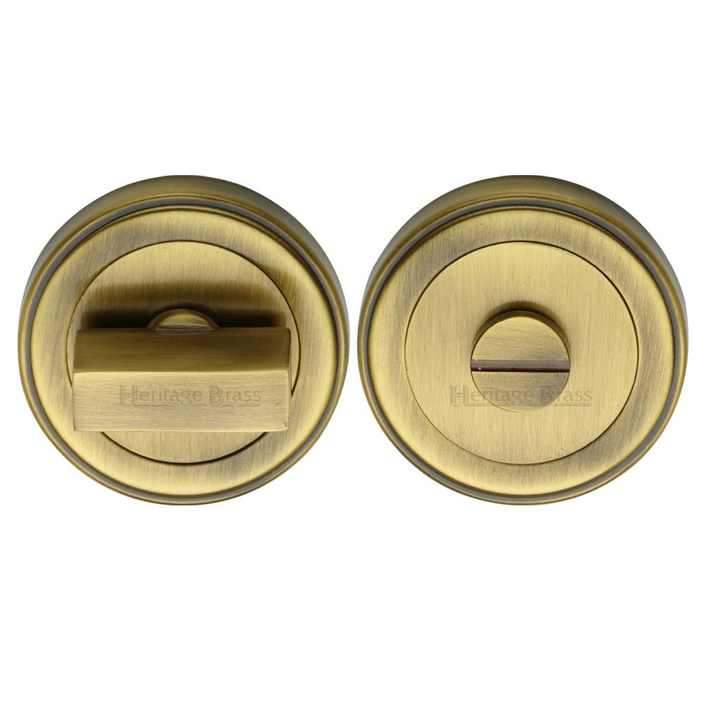 This is an image of a Heritage Brass - Round Turn & Release Cylinder with stepped edge Antique, erd7030-at that is available to order from T.H Wiggans Ironmongery in Kendal.