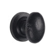 This is an image of a M.Marcus - Black Iron Rustic Cabinet Knob on Round Plate Oval Design 38mm, fb179-38 that is available to order from T.H Wiggans Ironmongery in Kendal.