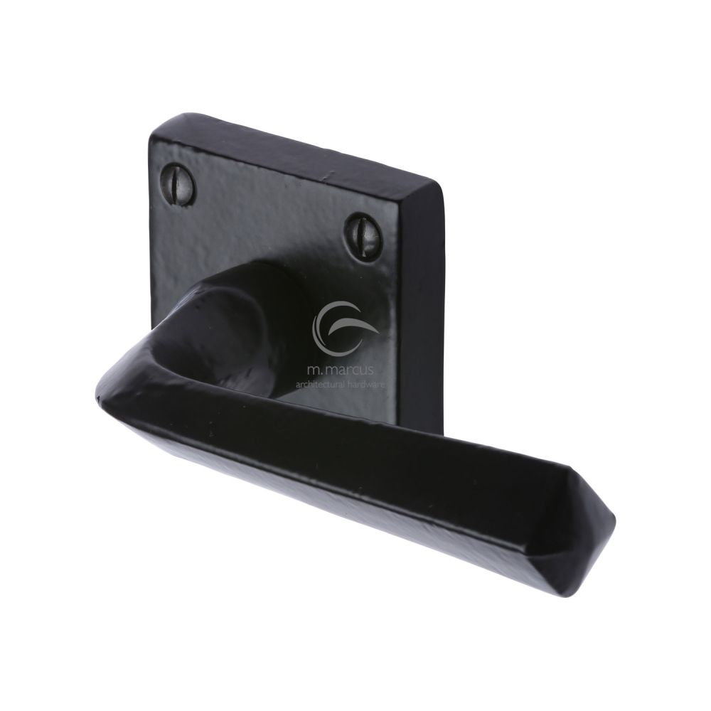 This is an image of a M.Marcus - Black Iron Rustic Door Handle Lever Latch on Square Rose Donnington D, fb1953 that is available to order from T.H Wiggans Ironmongery in Kendal.