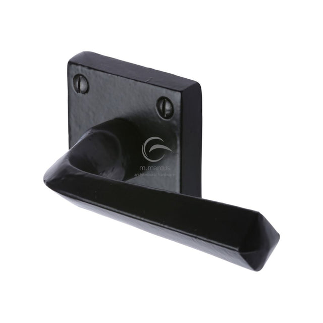 This is an image of a M.Marcus - Black Iron Rustic Door Handle Lever Latch on Square Rose Donnington D, fb1953 that is available to order from T.H Wiggans Ironmongery in Kendal.