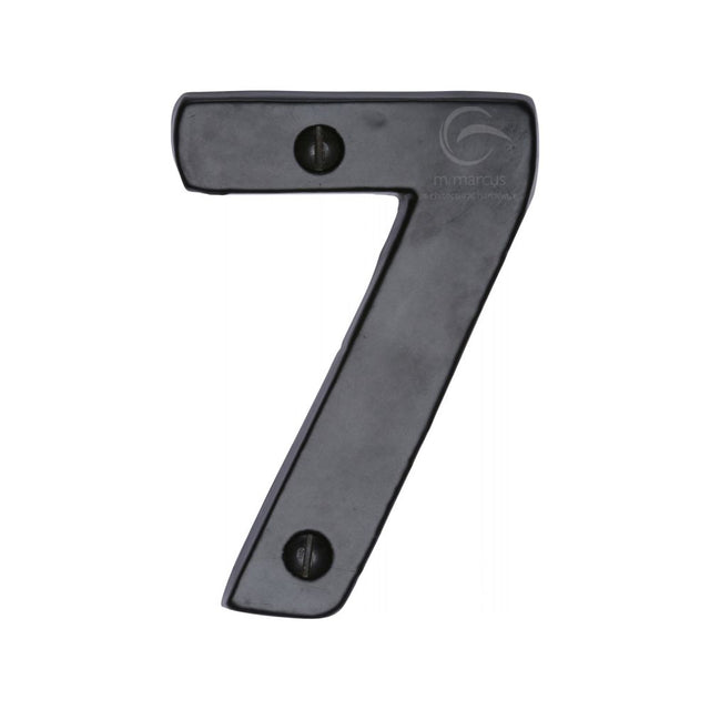 This is an image of a M.Marcus - Black Iron Rustic Numeral 7 Face Fix 76mm (3"), fb351-7 that is available to order from T.H Wiggans Ironmongery in Kendal.