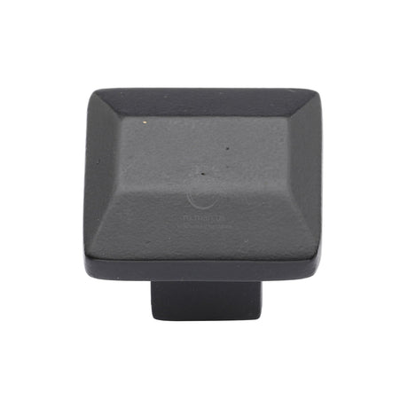 This is an image of a M.Marcus - Matt Black Rustic Iron Cabinet Knob Trapezoid Design 32mm, fb3625 that is available to order from T.H Wiggans Ironmongery in Kendal.