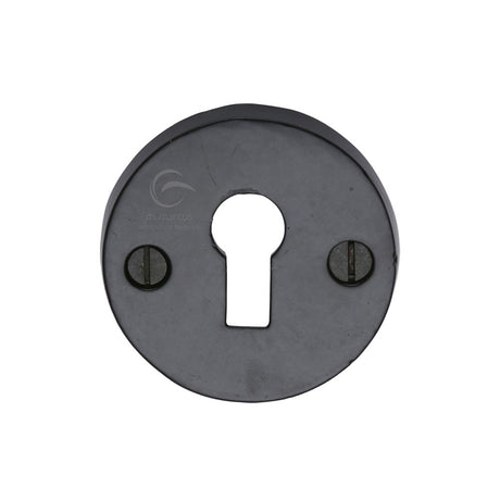 This is an image of a M.Marcus - Black Iron Rustic Key Escutcheon, fb553 that is available to order from T.H Wiggans Ironmongery in Kendal.