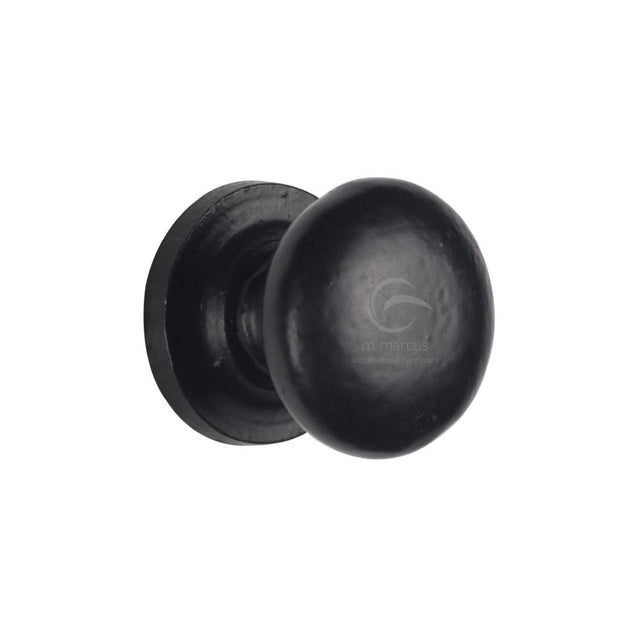 This is an image of a M.Marcus - Black Iron Rustic Cabinet Knob on Round Plate Round Design 25mm, fb613-25 that is available to order from T.H Wiggans Ironmongery in Kendal.