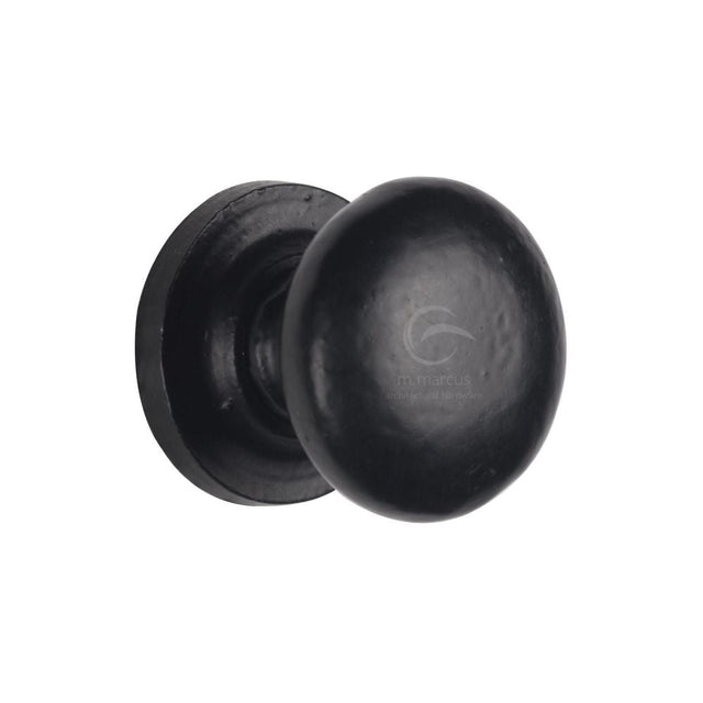 This is an image of a M.Marcus - Black Iron Rustic Cabinet Knob on Round Plate Round Design 32mm, fb613-32 that is available to order from T.H Wiggans Ironmongery in Kendal.