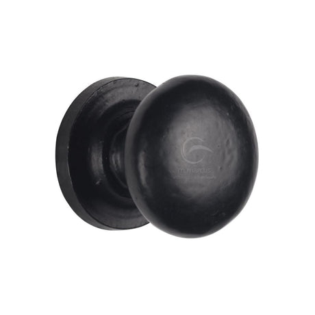 This is an image of a M.Marcus - Black Iron Rustic Cabinet Knob on Round Plate Round Design 38mm, fb613-38 that is available to order from T.H Wiggans Ironmongery in Kendal.