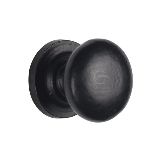 This is an image of a M.Marcus - Black Iron Rustic Cabinet Knob on Round Plate Round Design 38mm, fb613-38 that is available to order from T.H Wiggans Ironmongery in Kendal.